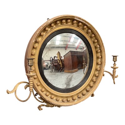 Lot 1387 - Regency girandole convex wall mirror