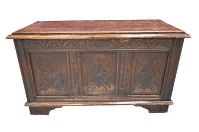 Lot 1409 - 18th century and later carved oak coffer
