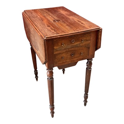 Lot 1414 - Early Victorian rosewood work table, with rectangular drop-leaf top over twin frieze and opposing fall-front cupboard, on facetted tapered supports and castors, 37cm wide x 55cm deep x 68cm high...