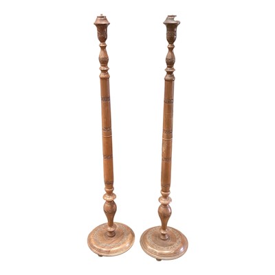 Lot 1371 - Pair of first half 20th century Oriental hardwood standard lamps, 152cm high