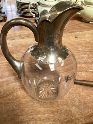 Lot 5147 - Silver mounted glass water jug, together with a silver mounted hunting crop and copper horn (3)