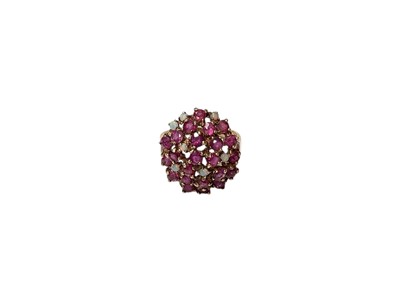 Lot 111 - Garnet and Opal cluster cocktail ring in 9ct gold setting