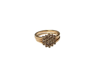 Lot 112 - Champagne diamond triple row ring with three individual bands of champagne diamonds in 9ct gold setting