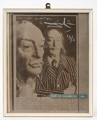 Lot 887 - Avec Les Hommages De Dali - Framed newspaper story, apparently hand signed by Salvador Dali