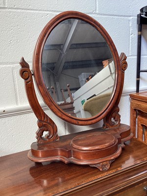 Lot 5313 - Victorian mahogany toiletry mirror with oval swing mirror on plateau base, 64cm high