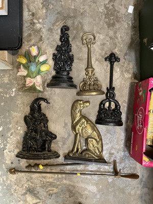 Lot 205 - Mr Punch iron doorstop and other doorstops