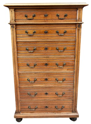 Lot 1435 - Edwardian walnut wellington chest