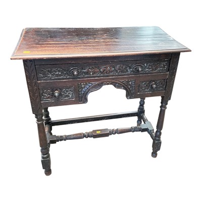 Lot 5388 - Late Victorian carved oak lowboy, 80cm wide