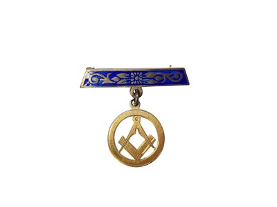 Lot 107 - 18ct gold Masonic pendant suspended from a silver and blue enamel bar brooch