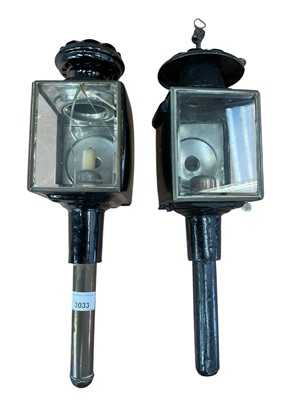 Lot 676 - Near pair of metal coach lamps in black painted finish.