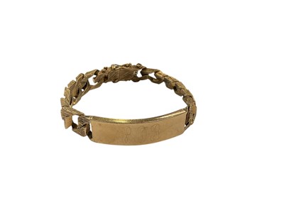 Lot 268 - 9ct gold flat curb link identity bracelet engraved 'BOB’