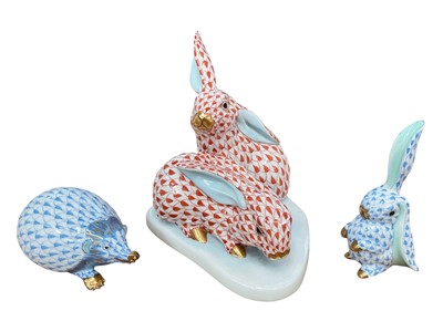 Lot 3 - Three Herend porcelain models of animals, including a group of two rabbits, 13.75cm high, another rabbit, and a hedgehog (3)