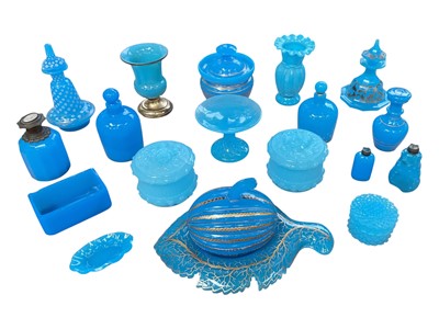 Lot 74 - Collection of late 19th and early 20th century blue opaline glass, including scent bottles, melon shaped box on leaf stand, covered jars, etc