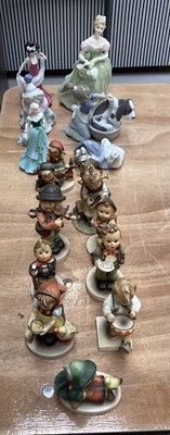 Lot 5054 - Hummel figures including Little Drummer (11) etc together with Lladro and Doulton figures
