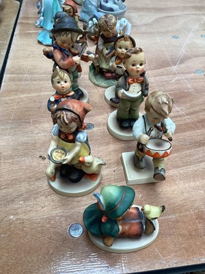 Lot 5054 - Hummel figures including Little Drummer (11) etc together with Lladro and Doulton figures