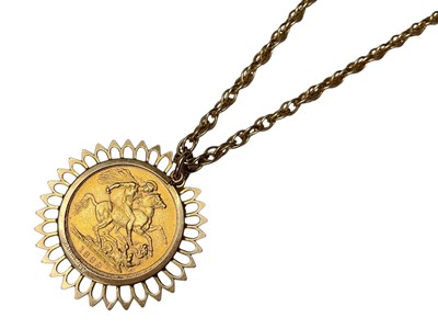 Lot 72 - Victorian gold sovereign, 1889, in 9ct gold pendant mount on yellow metal chain, 61.5cm long