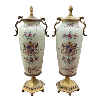 Lot 88 - Pair of gilt metal mounted famille rose style vases