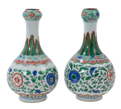 Lot 94 - Two Chinese Wucai 17th / 18th century bottle shaped vases