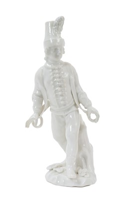 Lot 87 - Rare Meissen figure of a child sedan chair porter, modelled by P Reinecke, in the white, circa 1750