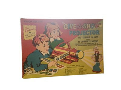 Lot 1825 - Chad Valley Give-A-Show Projector with additional slides, together with a World Cup 4-Way Scope and a Stereo Viewer