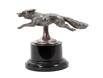 Lot 902 - Vintage chromium plated car mascot in the form of a running fox, on ebonised plinth base, 12cm high overall x 14.5cm wide