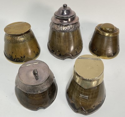 Lot 909 - Group of five late Victorian and Edwardian horse hooves converted to inkwells and a vesta holder, with brass mounts and silver plated mounts (5)
