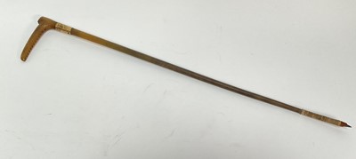 Lot 913 - Late 19th century Rhinoceros horn riding crop, with gold plated collar stamped 'Kent', 60.5cm long