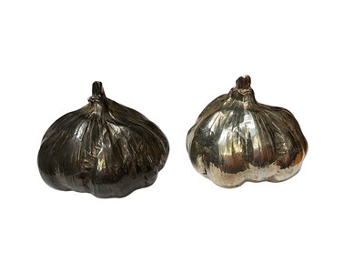 Lot 135 - Two naturalistic silver filled models of garlic bulbs