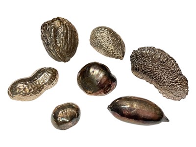Lot 136 - Seven naturalistic silver filled models of various nuts