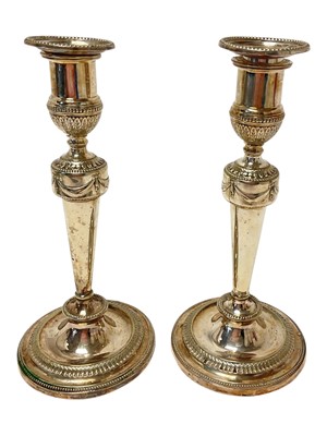 Lot 235 - Pair of silver plated candlesticks