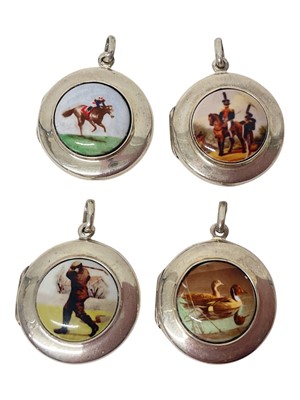 Lot 63 - Four contemporary silver and enamel circular lockets depicting a jockey, cavalry soldier, golfer and ducks