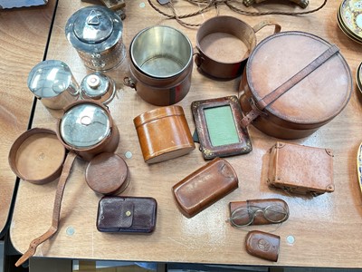 Lot 5207 - Group of antique and vintage leather items, including a silver plated burner in leather case, another burner, antique spectacles in case, miniature suitcase, etc