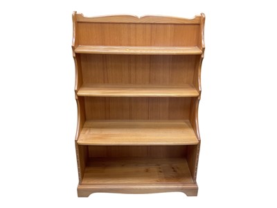 Lot 5330 - Modern Ercol waterfall bookcase, 88cm wide, 33cm deep, 128cm high