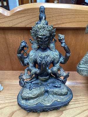 Lot 5092 - Group of oriental items including a Tibetan bronze Buddha, copper ewers etc