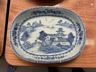 Lot 5231 - Late 18th century Chinese blue and white porcelain deep dish, painted with a landscape scene, 32.5cm wide