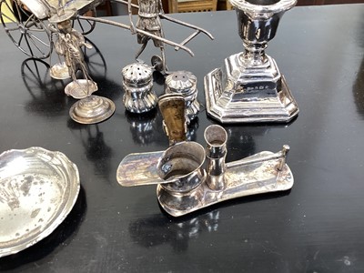 Lot 5094 - Group of silver and white metal, including a Chinese rickshaw and figures, sterling silver candle stick etc