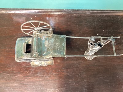 Lot 5094 - Group of silver and white metal, including a Chinese rickshaw and figures, sterling silver candle stick etc