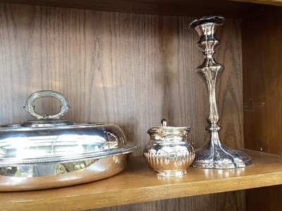 Lot 5096 - Group of silver plate including a four piece tea and coffee set, tureens, pair of Elkington candle sticks etc