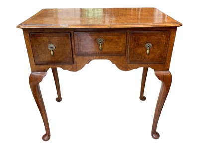 Lot 5346 - Queen Anne style walnut lowboy with crossbanded top, three drawers below on cabriole legs, 76cm wide, 46cm deep, 72cm high