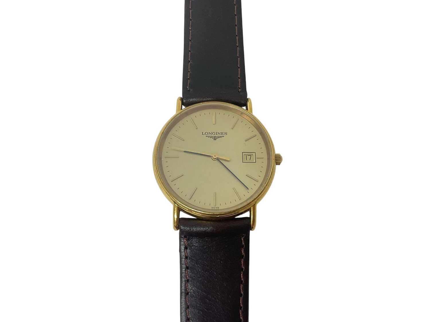 Lot 74 - Longines quartz wristwatch with circular gilt dial, baton markers and date aperture at 3 o'clock in a gold plated case with stainless steel back, 32mm diameter, on a replacement leather strap