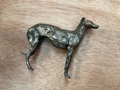 Lot 5099 - Small bronze greyhound in the style of Stuart Anderson, 9cm high