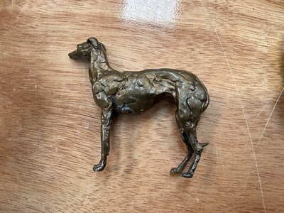 Lot 5099 - Small bronze greyhound in the style of Stuart Anderson, 9cm high