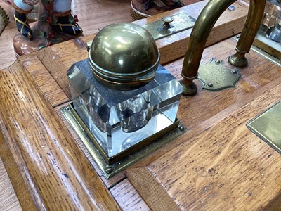 Lot 5100 - Edwardian oak inkstand with two cut glass bottles, 38cm wide