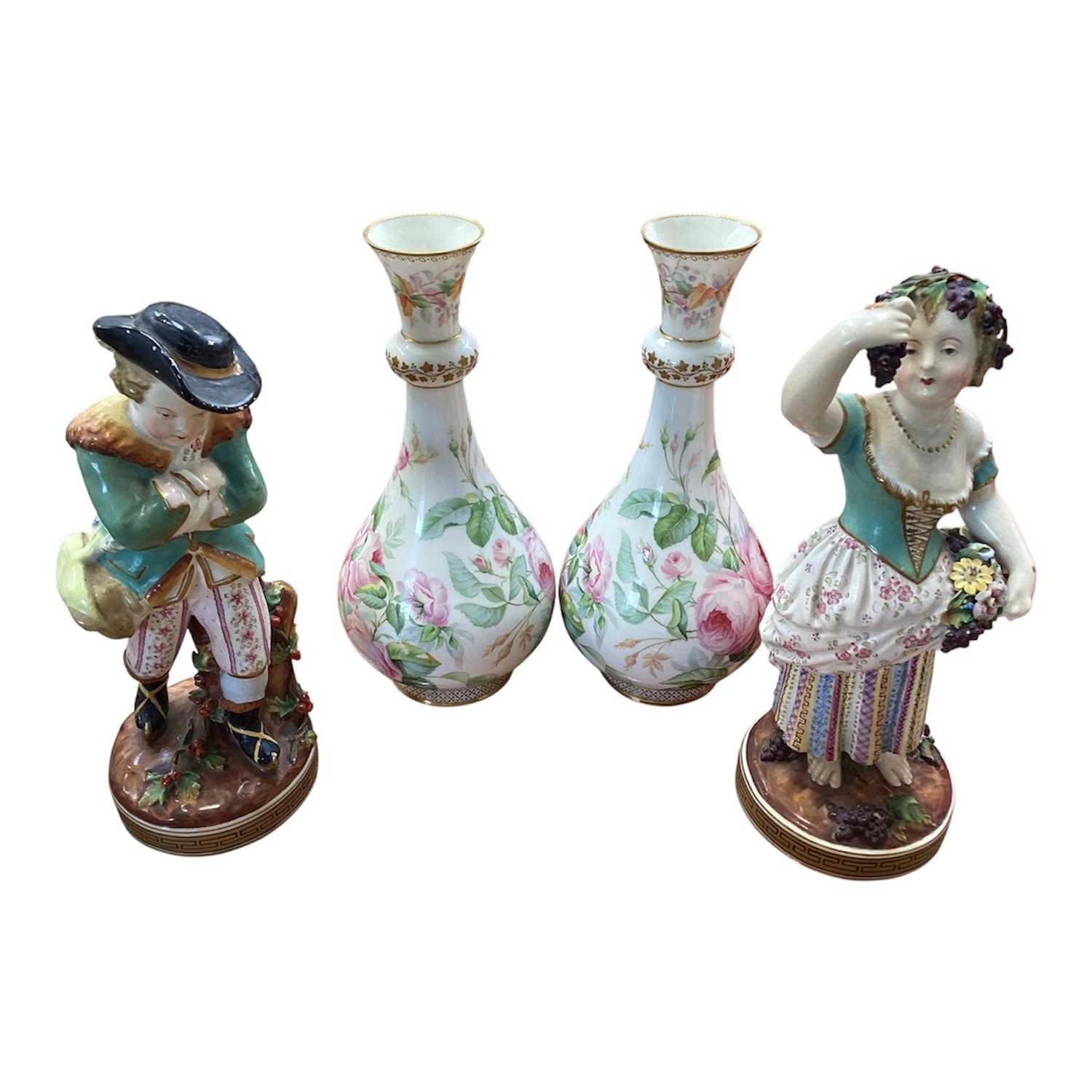 Lot 5101 - Pair of Victorian Staffordshire John Bevington figures, 25cm high, together with a pair of 19th century English porcelain vases painted with roses (4)