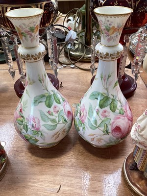 Lot 5101 - Pair of Victorian Staffordshire John Bevington figures, 25cm high, together with a pair of 19th century English porcelain vases painted with roses (4)