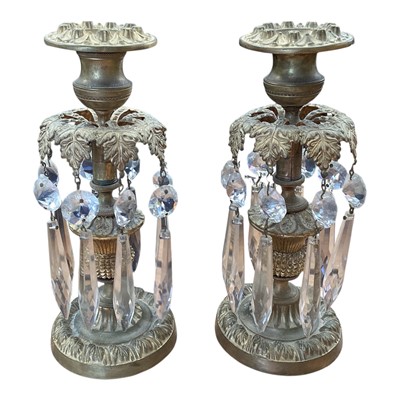 Lot 5104 - Pair of 19th century gilt brass candlesticks with foliate decoration, thistle stems and prismatic cut glass drops, 22.5cm high