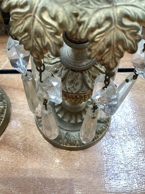 Lot 5104 - Pair of 19th century gilt brass candlesticks with foliate decoration, thistle stems and prismatic cut glass drops, 22.5cm high