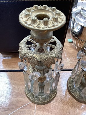 Lot 5104 - Pair of 19th century gilt brass candlesticks with foliate decoration, thistle stems and prismatic cut glass drops, 22.5cm high