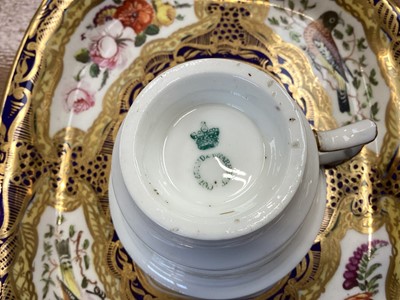 Lot 5105 - 19th century Copeland & Garrett porcelain tea set, comprising 8 saucers, 4 cups and one stand, polychrome painted with flowers and birds on a cobalt blue, pale yellow and gilt ground, some p...