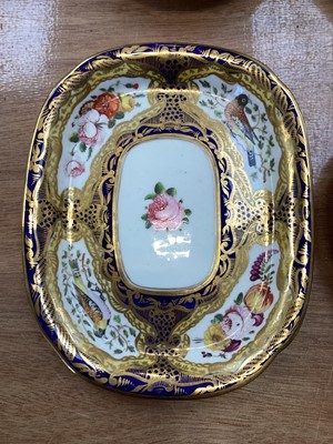 Lot 5105 - 19th century Copeland & Garrett porcelain tea set, comprising 8 saucers, 4 cups and one stand, polychrome painted with flowers and birds on a cobalt blue, pale yellow and gilt ground, some p...